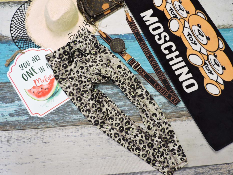 Crivit Nowe legginsy push up cętki S
