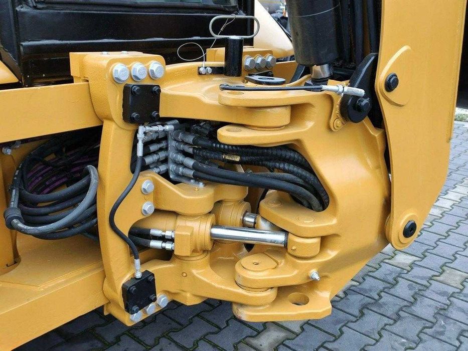 Екскаватор-навантажувач Caterpillar 444E