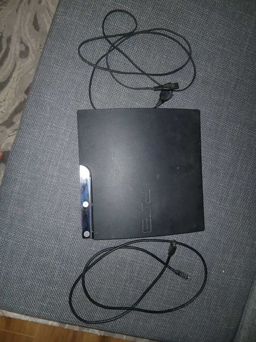 Playstation 3 usada com alguns bons jogos.