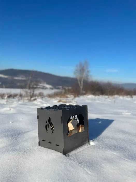 Przenośny składany grill i palenisko – idealny na biwak i do kampera