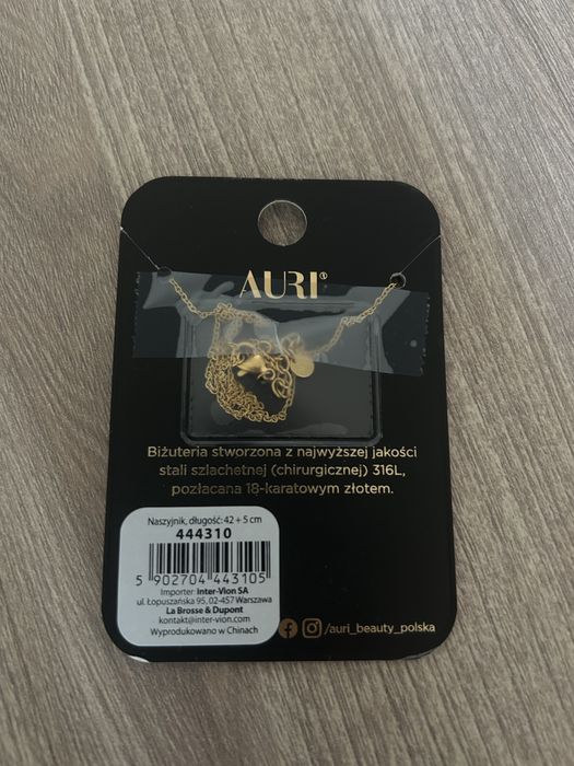 Złoty naszyjnik z sercami