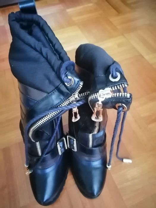 Botas cano alto novas