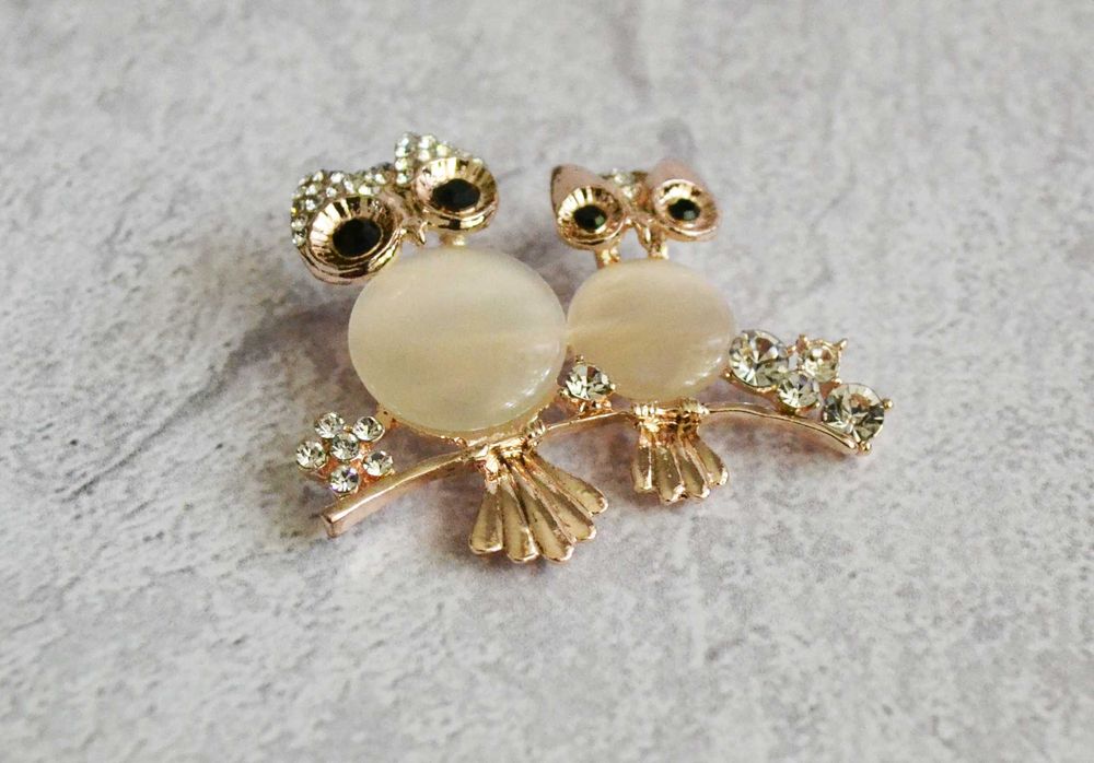 Broszka dwie sowy cyrkonie kocie oko