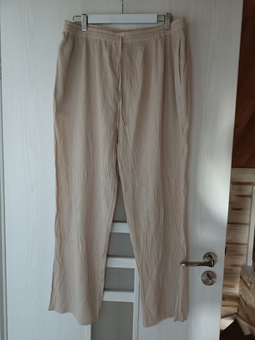 Spodnie beżowe z szerokimi nogawkami z wiskozy L-XL damskie letnie