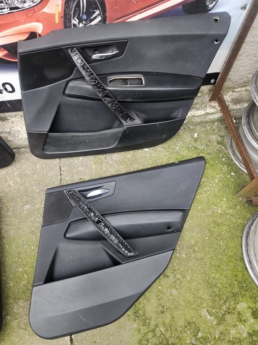 Дверні карти БМВ Х3 Е83 BMW X3 E83 обшивки шкіряні карти кожание