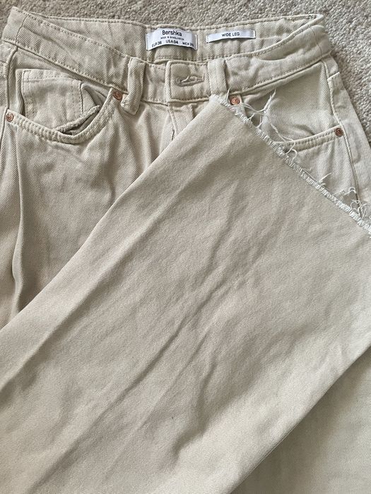 Джинси жіночі з дирками на колінах