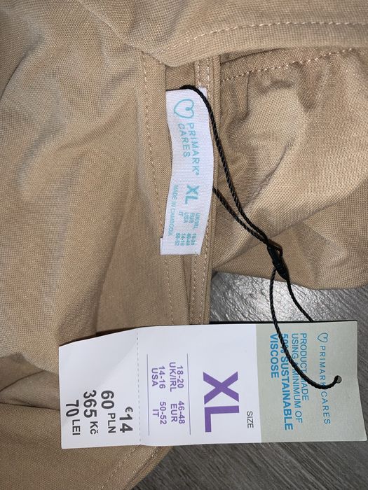 Beżowy kombinezon nowy primark xl