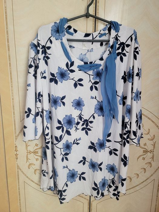 Великі розміри кофт та тунік