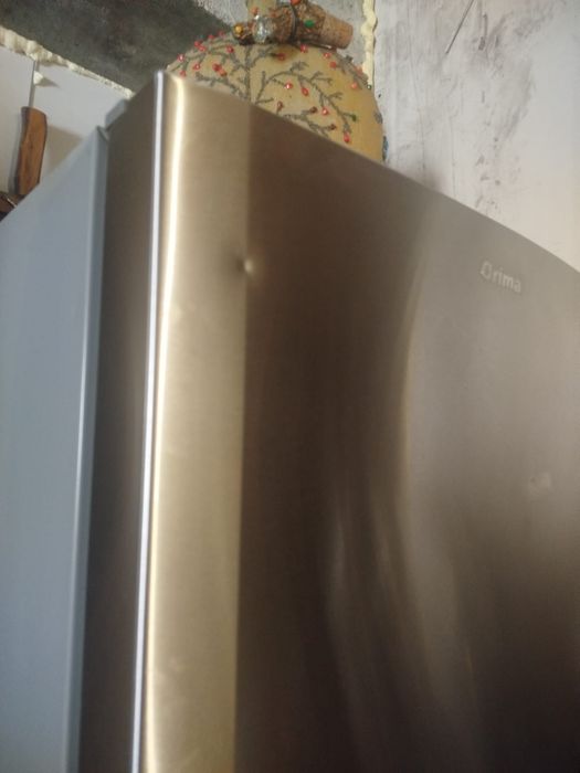 Frigorifico a foncionar  bem , em otimo estado