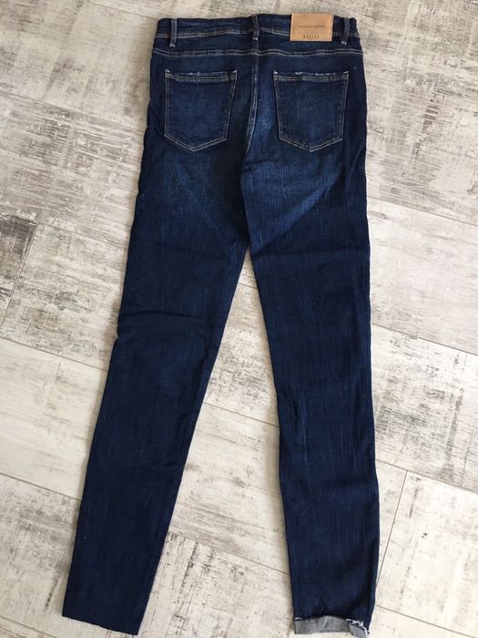 Nowe spodnie jeansowe z naszywkami Mohito xs 34