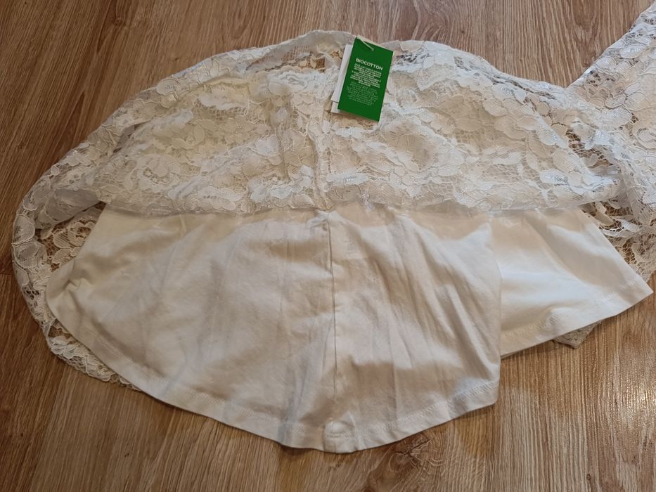 2 koronkowe spódniczki białe OVS r. 140