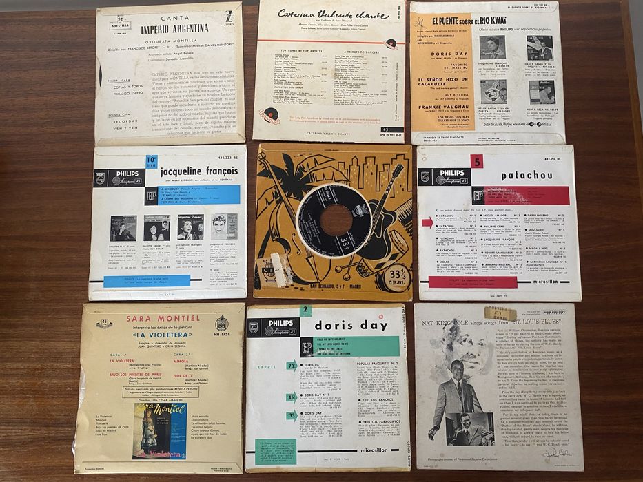 Conjunto de 17 singles em vinil com porta singles