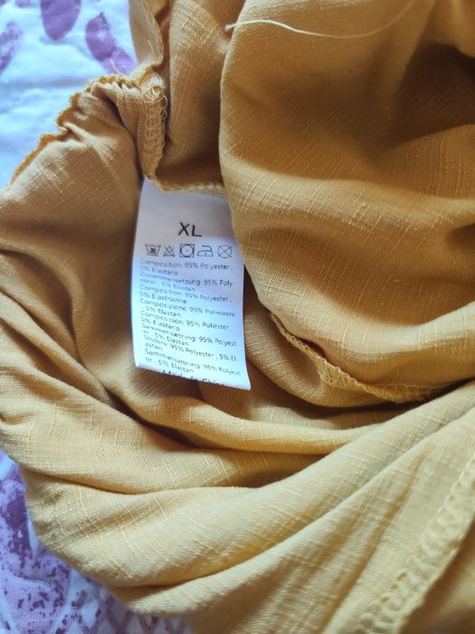 Calças largas amarelas para senhora