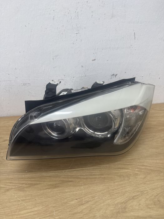 Lampy przednie BMW X1 E84 przedlift  BI XENON  Komplet