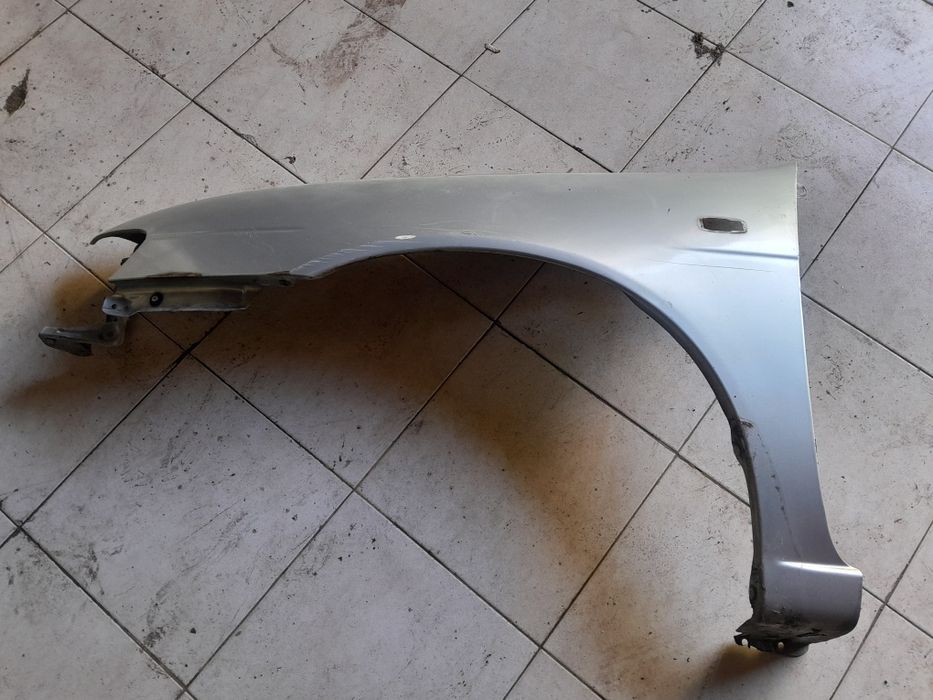 Guarda lamas esq nissan almera n15