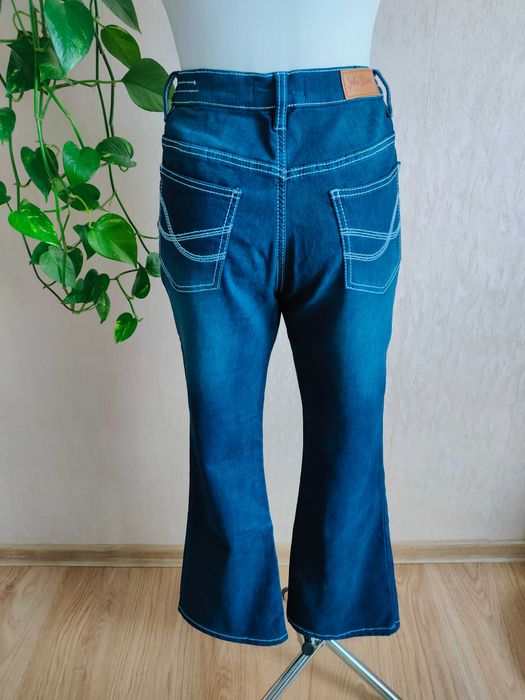 NOWE niebieskie spodnie jeans dzwony 7/8 wysoki stan r. 40 L John Baner