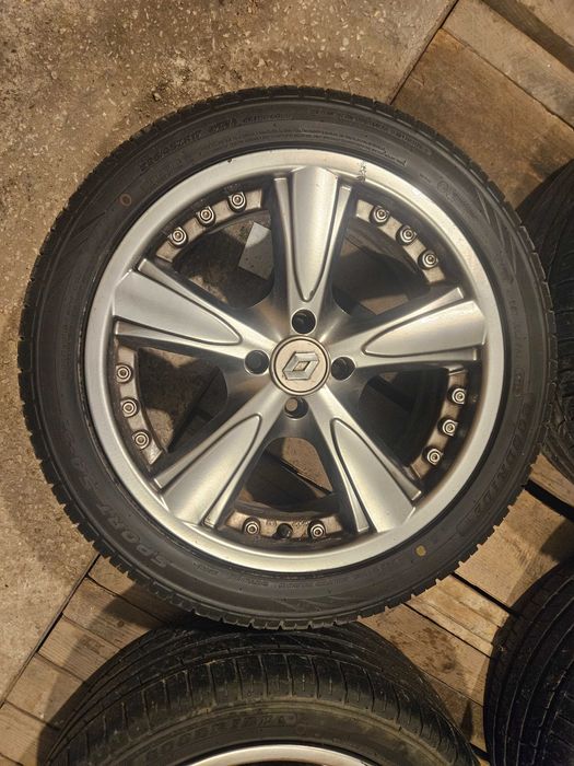 Koła letnie 17" 4x100 Renault 60.1 7J aluminiowe śruby