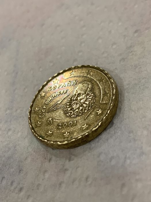 Moeda raríssima com  serrilhas em volta do bordo