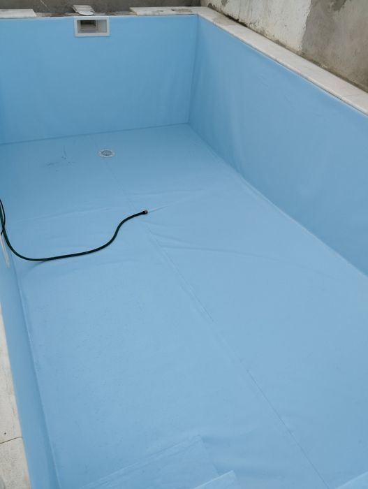 Aplicação de tela para piscinas