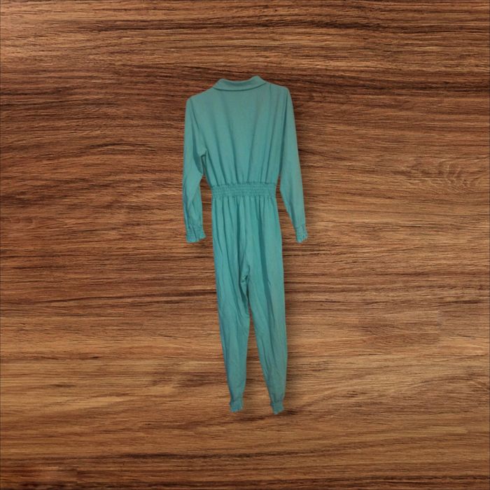 Kombinezon turkusowy