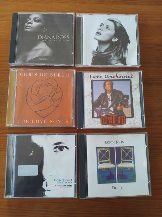 Conjunto de CDs música diversa