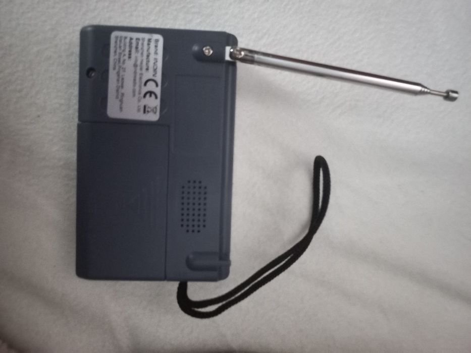 Rádio a pilhas (2AA) Novo.