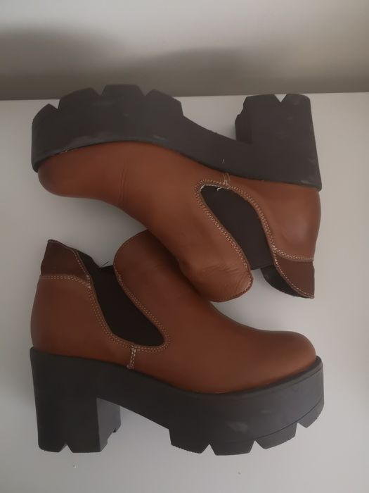 Botas de inverno em pele