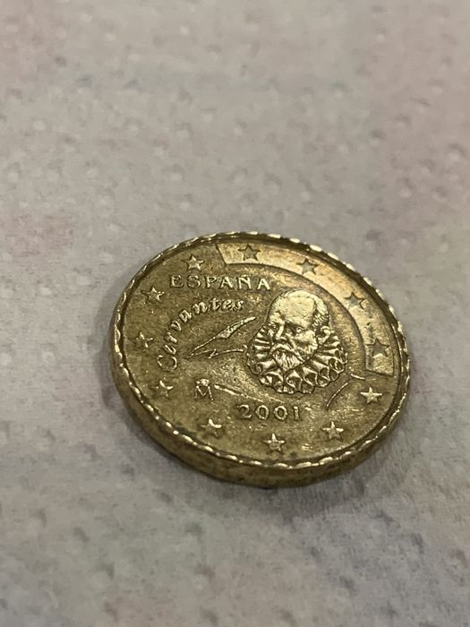 Moeda raríssima com  serrilhas em volta do bordo