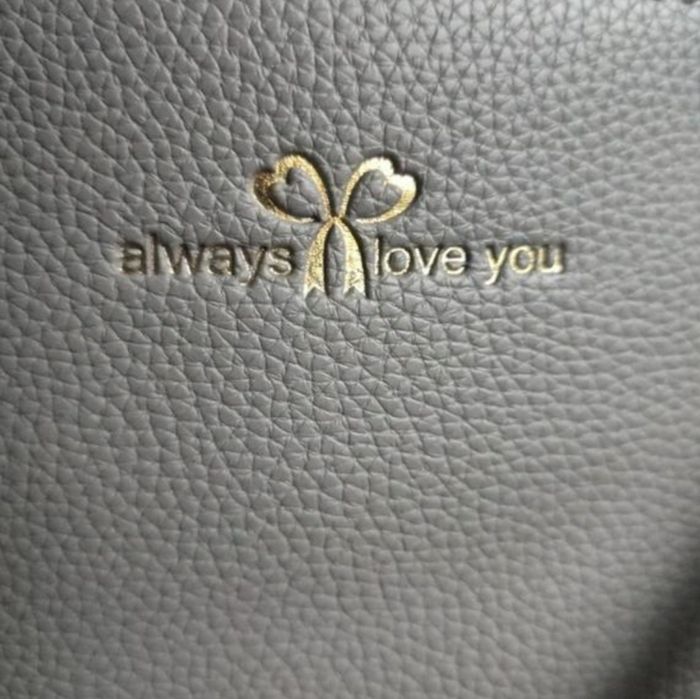 Жіноча маленька сіра  сумочка