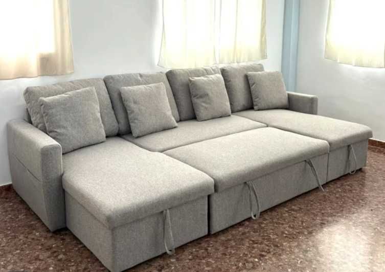 sofá-cama novo de gama alta em cinzento