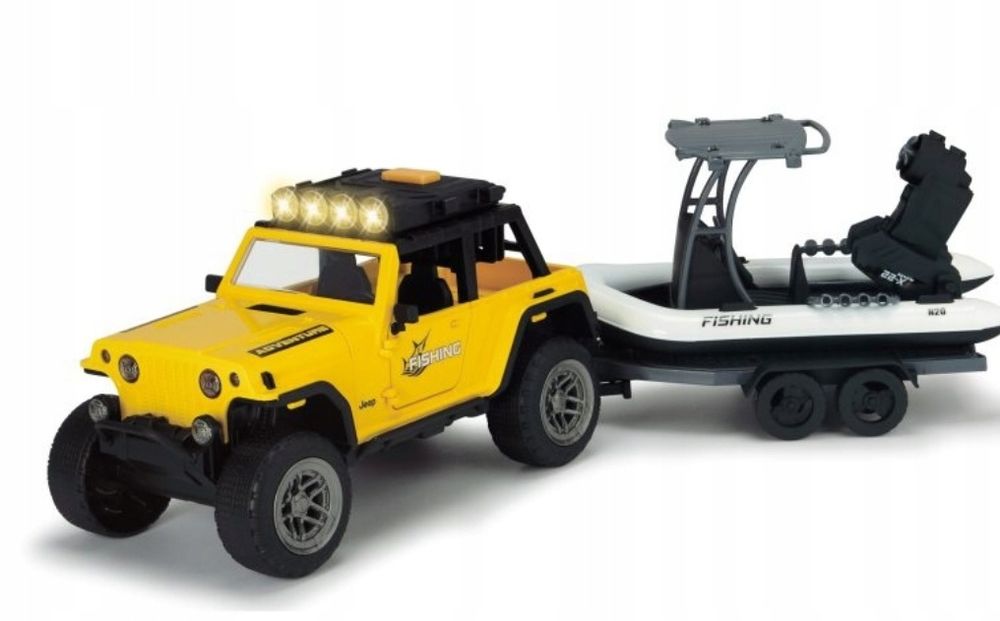 Jeep z przyczepą i łodzią