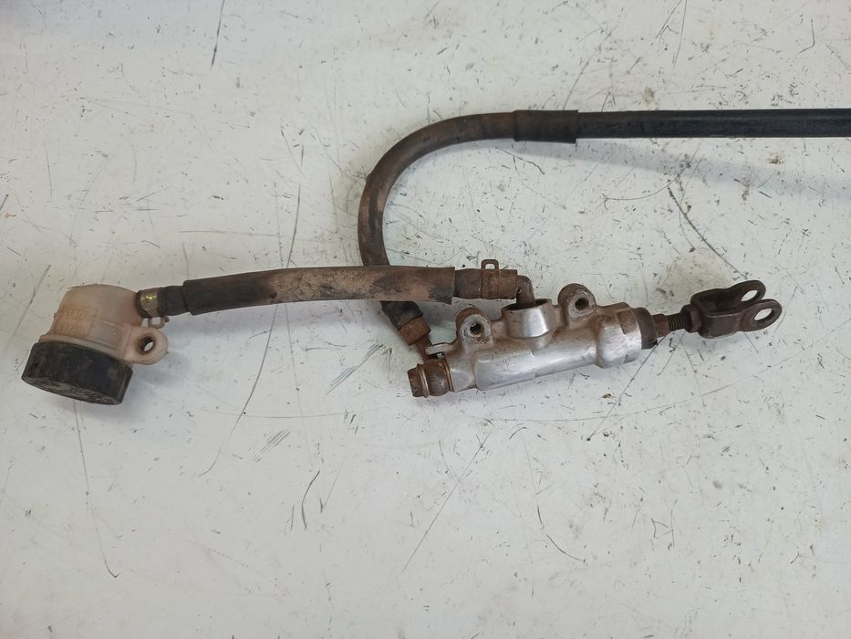 Zacisk hamulcowy tył tylny pompa hamulcowa tył Suzuki RM 125 / 250 95r