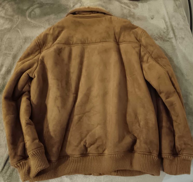 Casaco de pele (forrado com pelo)