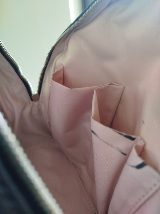 Mochila preta da tous  tenho certificado de autenticidade