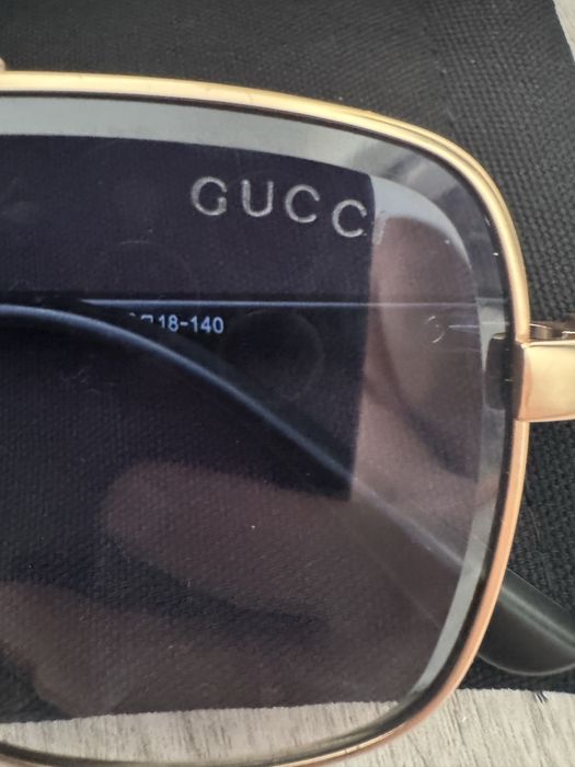 Сонцезахисні окуляри Gucci