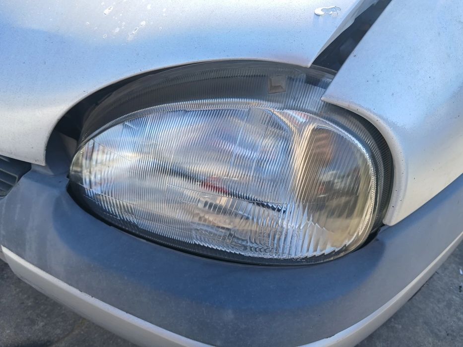 Ótica / farol esquerda OPEL Corsa B