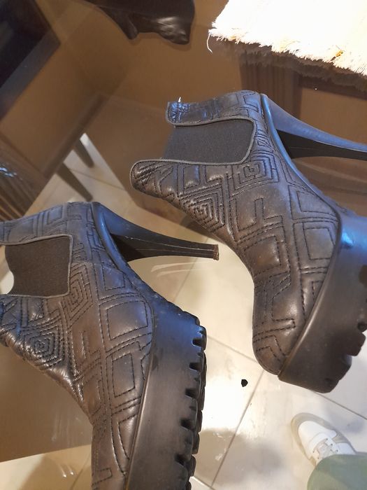 Botas pretas prof novo preço