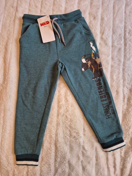 NOWE ciemnozielone spodnie dresowe NKD rozmiar 98 104 bawełna