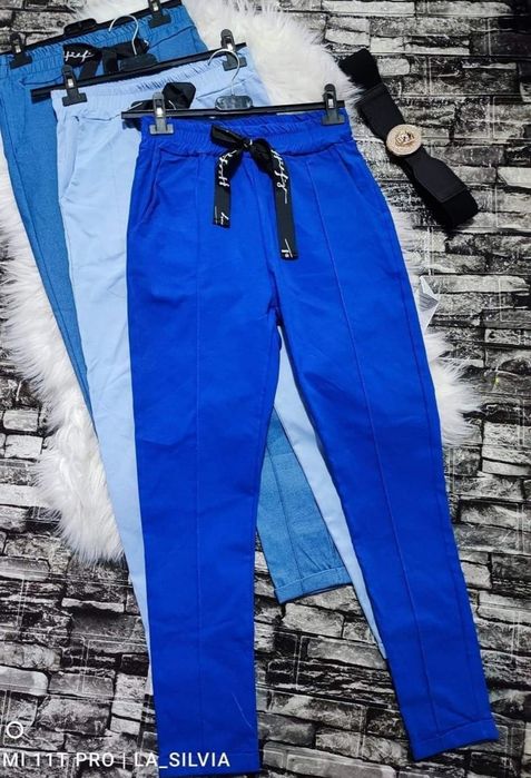 Chabrowe spodnie damskie z przeszyciami