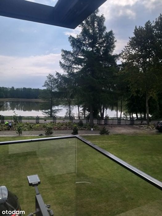 Dom z sauną, jacuzzi. Duży ogród, widok na Jeziorak - pierwsza linia.