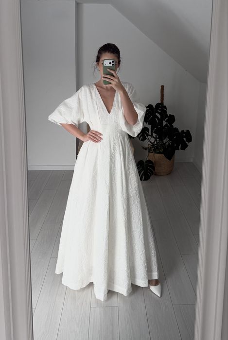 Suknia slubna romantyczns asos bufiaste rekawy kieszenie