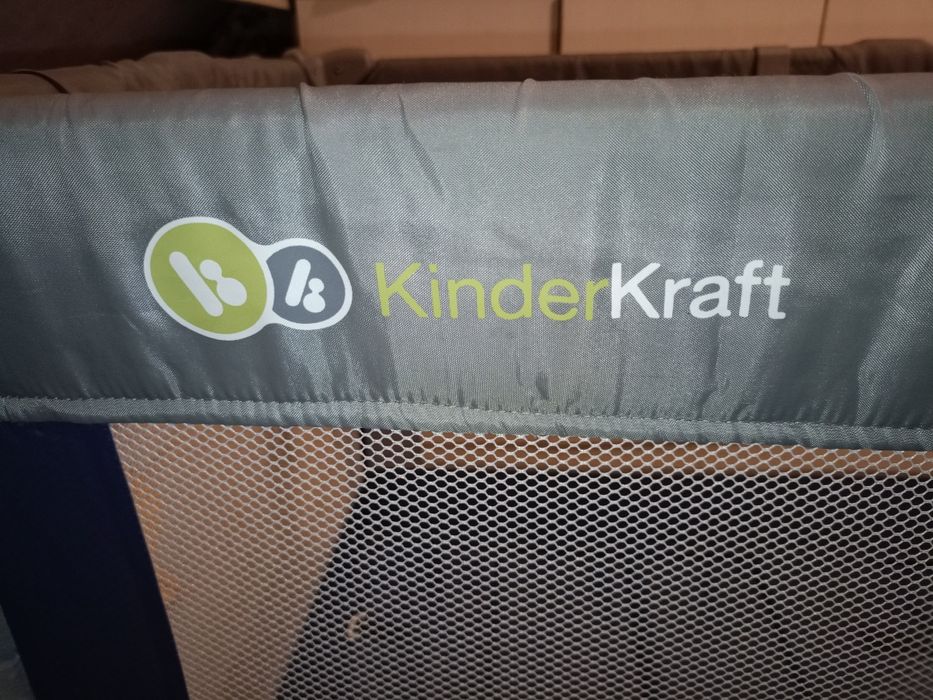 Łóżeczko turystyczne Kinderkraft i Smiki