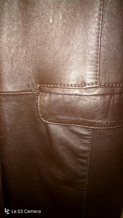 Casaco comprido de mulher,castanho em pele genuína,forrado.Como novo!