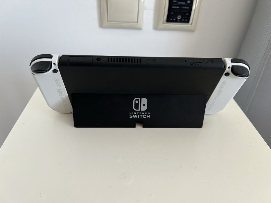 Latest Nintendo Switch model: Nintendo Switch OLED. +2 games