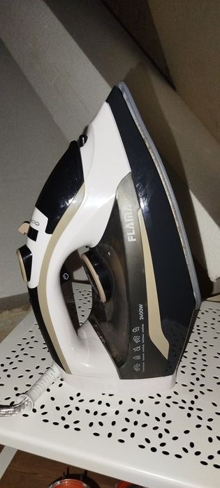 Ferro e tábua de passar