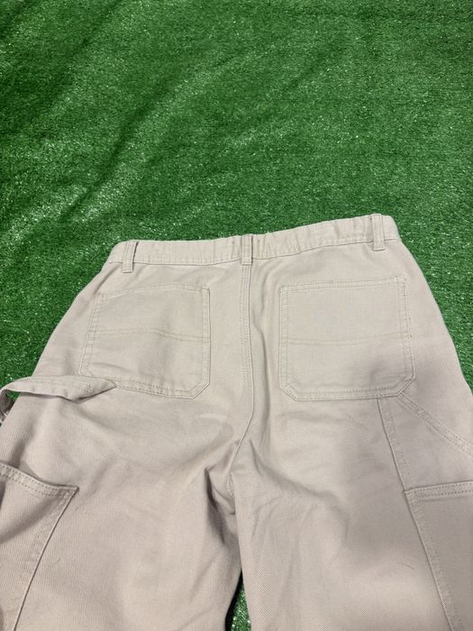 Облягаючі втягуючі кльош штани