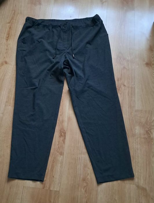 Wygodne szerokie  nowe spodnie z kieszeniami rozmiar  4/6xl