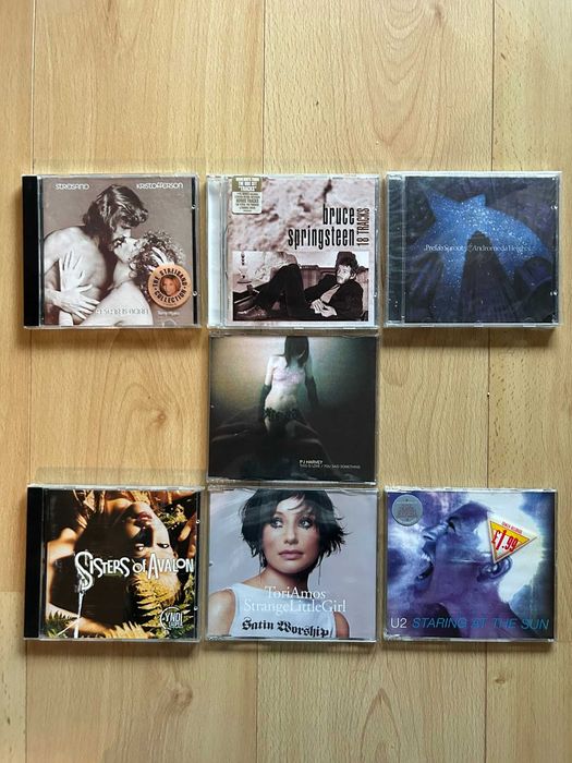 Vários CDs: U2, Streisand, Prefab Sprout, Springsteen e mais