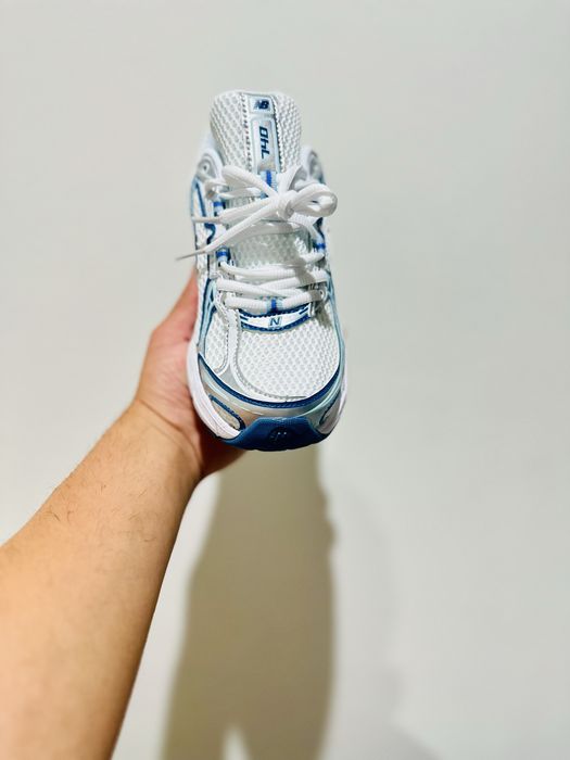 NB 740 branco e cinza, azul e branco