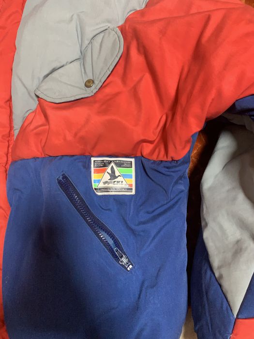 Kispo de penas de cor azul